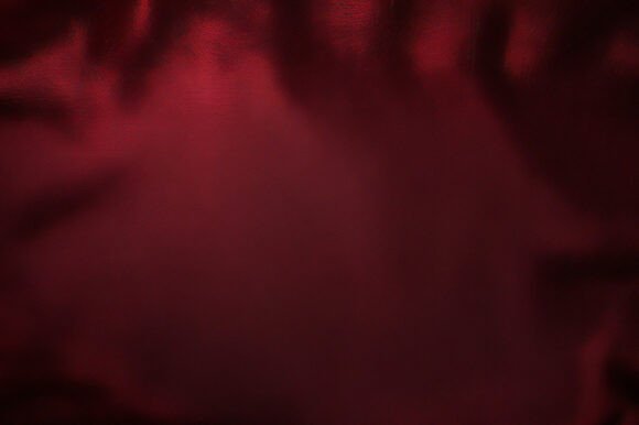 A Red Fabric with a Blurry Background: A Versatile Design Element